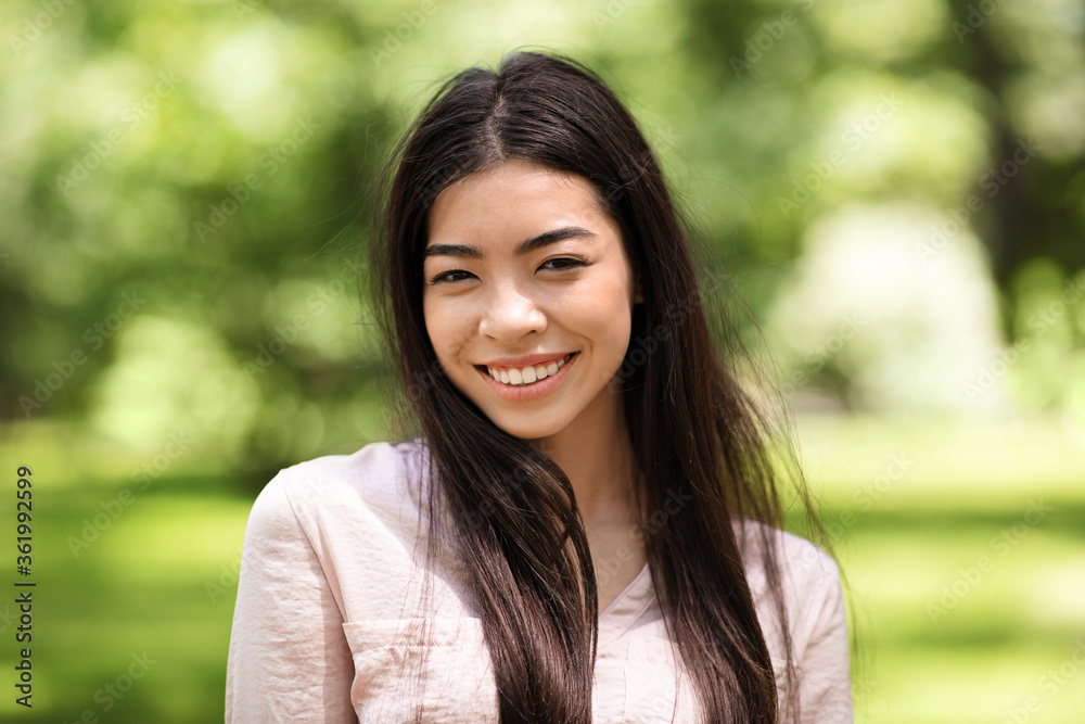 Asian Beauty. Outdoor Portrait Of Smiling Beautiful Korean Girl In Summer Park Asian Beauty. Outdoor Portrait Of Smiling Beautiful Korean Girl In Summer Park
