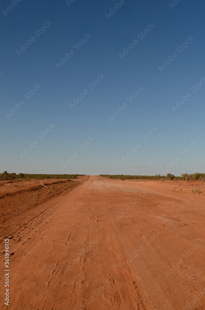 A strip of dirt road north of Menindee in Australia