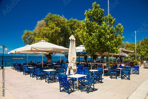 Street restaurant and caffe in Amarynthos village  Evia island  Greece.