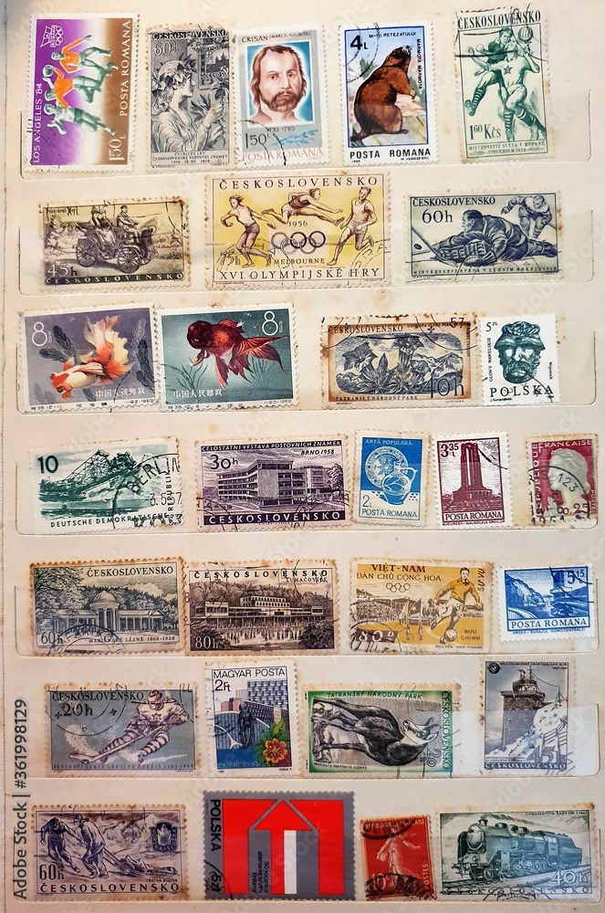 many old stamps on a philately catalog page many old stamps on a philately catalog page