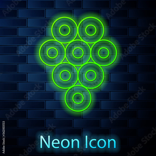 Glowing neon line Caviar icon isolated on brick wall background. Vector..
