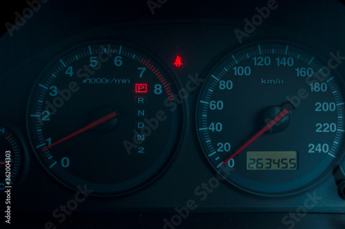 Black speedometer from a close-up car and symbol inside the screen