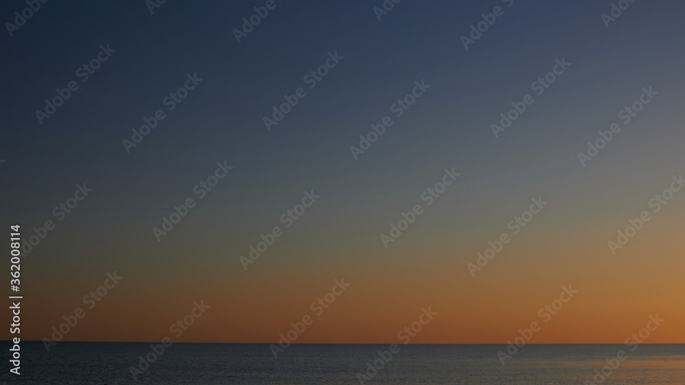beautiful sky and black sea sky line at sunset