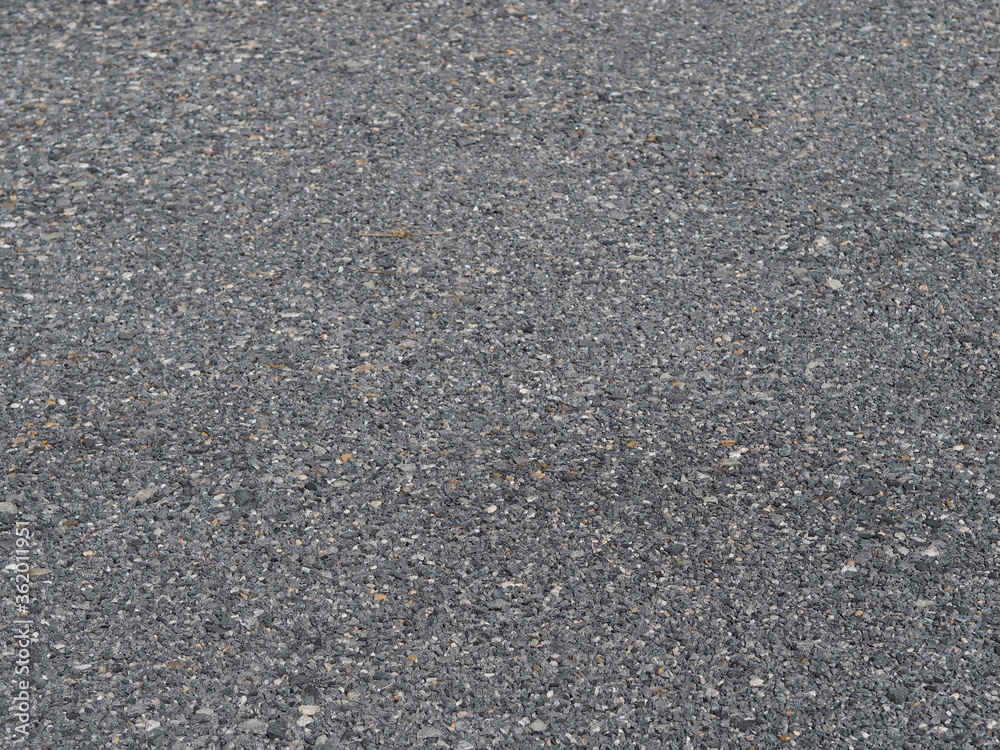 The texture of the background of stone black gray asphalt road, Asphalt 