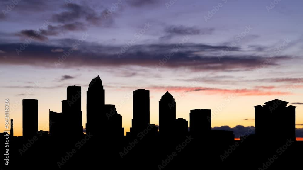 Tampa: Time Lapse at Twilight with Colourful Sky and Dark Silhouette of Downtown, Florida, USA Tampa: Time Lapse at Twilight with Colourful Sky and Dark Silhouette of Downtown, Florida, USA