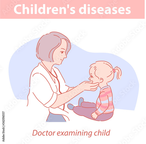 Pediatrician examining baby. Little girl in medical clinic.