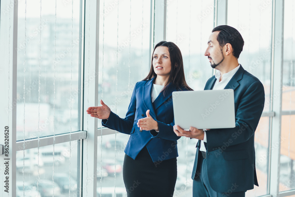 Busy people discussing profitable startup, planning their futher business strategy. Busy people discussing profitable startup, planning their futher business strategy.