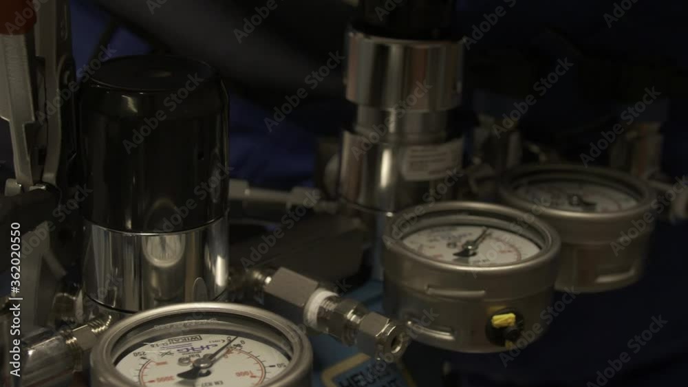 Technician assembling an industrial component. Technician assembling an industrial component.