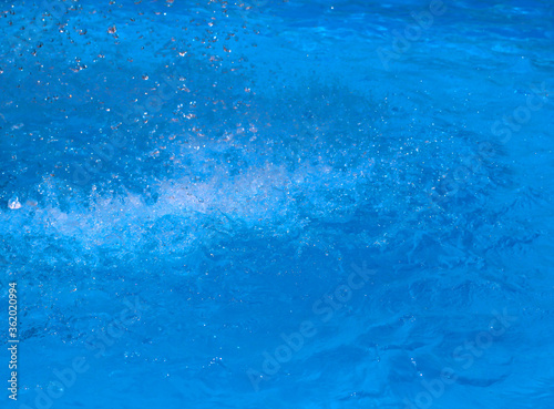 A splash of water. Splashes of blue water.