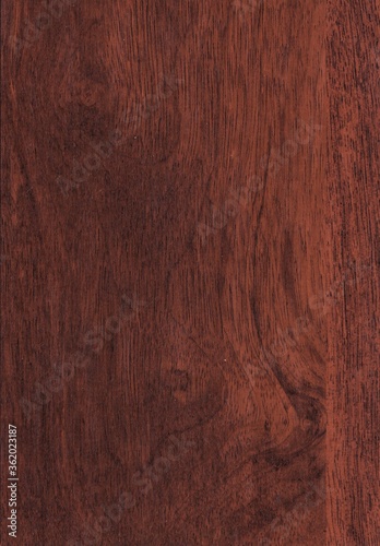 Natural wood grain design of oak wood with cherry stain finish. Macro showing texture and details.