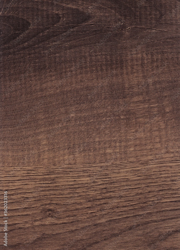 Fototapeta premium Natural wood grain design of oak wood with cherry stain finish. Macro showing texture and details.
