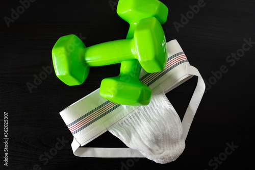 Foto Jockstrap and Dumbbells