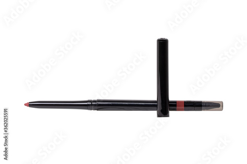 Cosmetic tools. Macro photograph of a professional pink lip liner pencil isolated on a white background. Beauty concept. photo