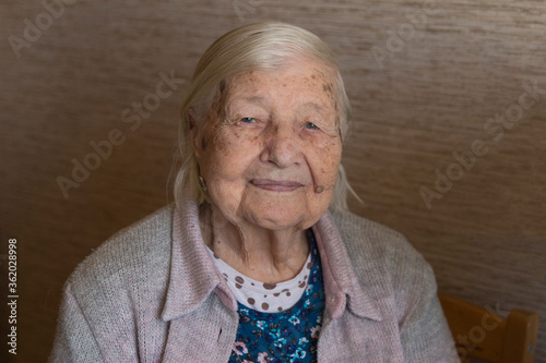 Tableau sur toile Portrait of elderly woman. Age 90 years. Woman is smiling
