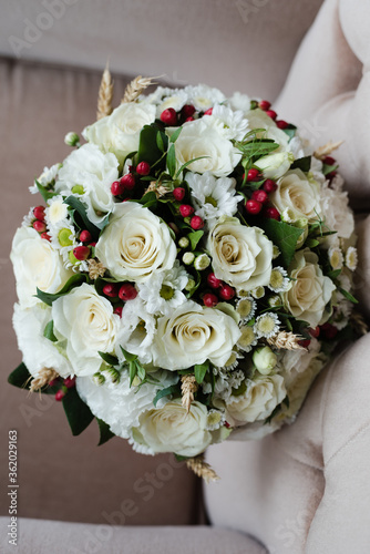 Fototapeta Naklejka Na Ścianę i Meble -  bridal bouquet of white roses, wedding day