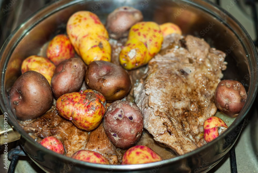 Beef steaks cooked to the pan with onions, Andean potatoes, fine herbs and spices. Beef steaks cooked to the pan with onions, Andean potatoes, fine herbs and spices.