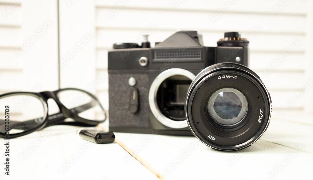 Old retro camera with heart love photography creative concept