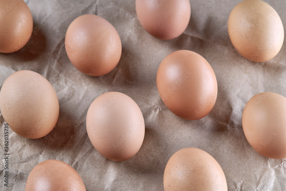 hen eggs background backdrop. stack of eggs over paper background. hen eggs background backdrop. stack of eggs over paper background.