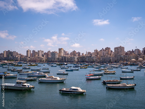 Boats and the skyline of colonial Alexandria © Florian