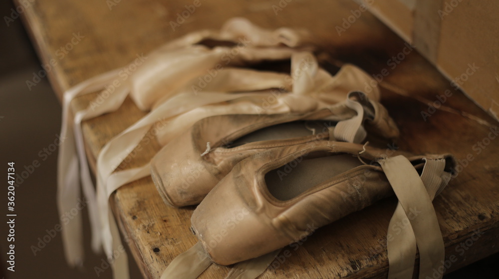 Old Ballet shoes in a Table