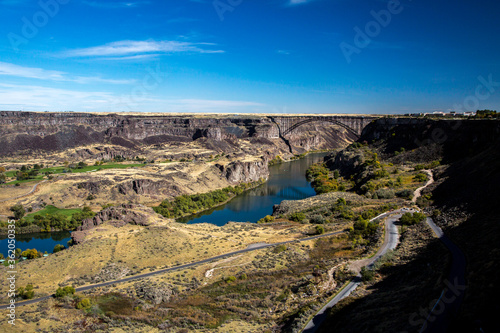 The Snake River and Perrine Bridge. It is a truss arch span in the western United States, carrying traffic over the Snake River, located at Twin Falls, Idaho.