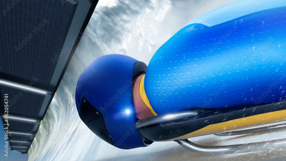 Skeleton sport. Bobsled. Luge. The athlete descends on a sleigh on an ice track. Winter sports. Skeleton sport. Bobsled. Luge. The athlete descends on a sleigh on an ice track. Winter sports.