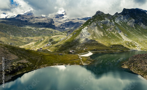 Landscape with mountain lake in Alps