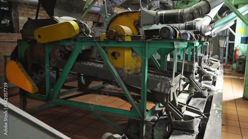Wallpaper Mural mechanical sorter, sifter sunflower seeds at factory. machine is running. Torontodigital.ca