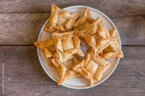 Fototapeta Naklejka Na Ścianę i Meble -  fried pastry with quince and batata typical of south america gastronomy