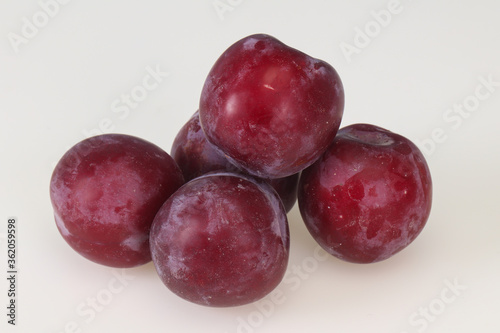 Sweet ripe plum isolated on white