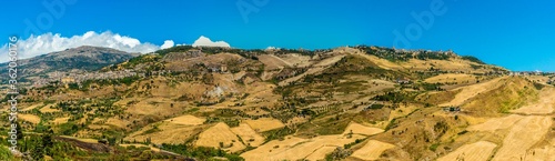 Panorama view of the twin hilltop settlements of Petralia Sottana and Petralia Soprana in the Madonie Mountains, Sicily during summer