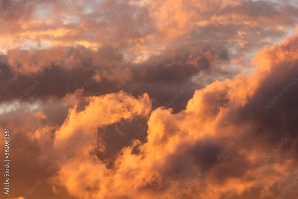 Clouds lit by the sun at sunset.