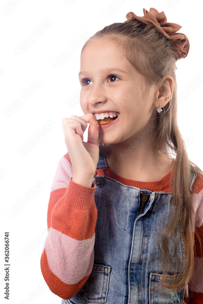 Little girl with orthodontics appliance isolated on white background. Little girl with orthodontics appliance isolated on white background.