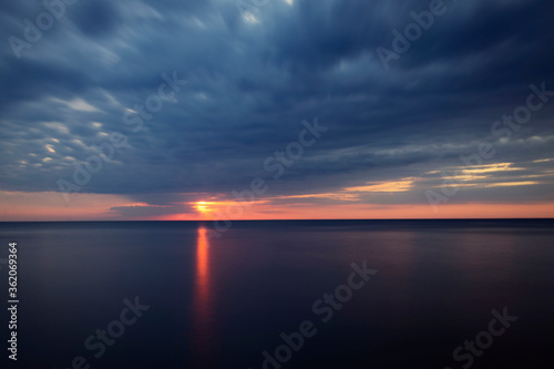 sunset over the sea © Arek