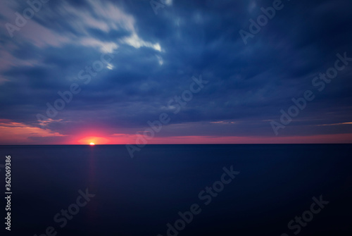 sunset over the sea © Arek