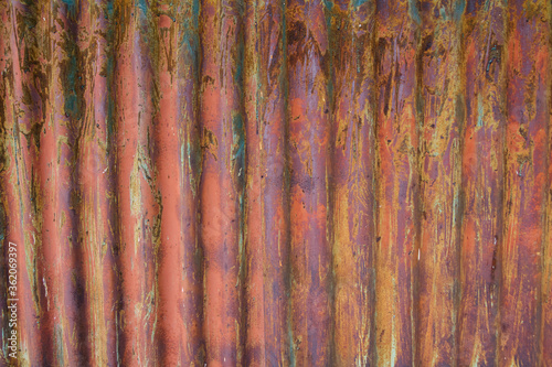 Fluted rusted metal with deep chipped texture