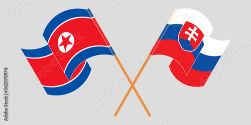 Photography Crossed and waving flags of North Korea and Slovakia