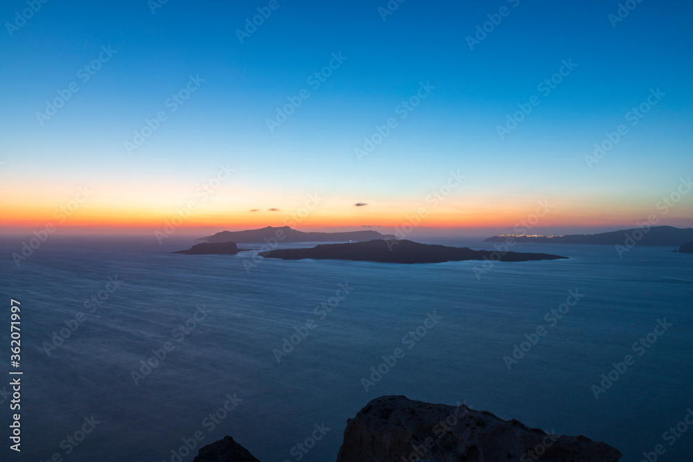 Sunset over Caldera on Santorini island in Greece.