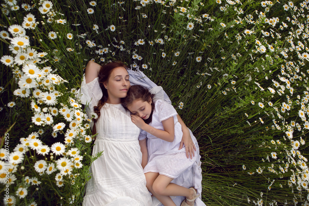 mother with daughter in a white dress mother with daughter in a white dress