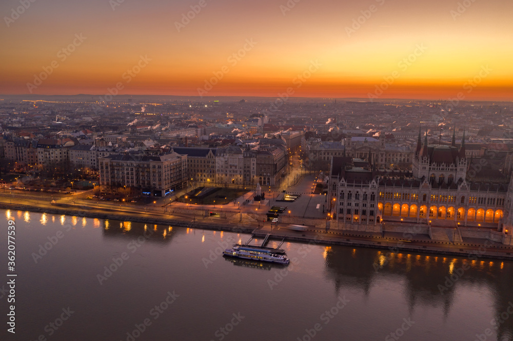 Aerial drone shot of Kossuth square north Hungarian Parliament lights off before sunrise in Budapest dawn