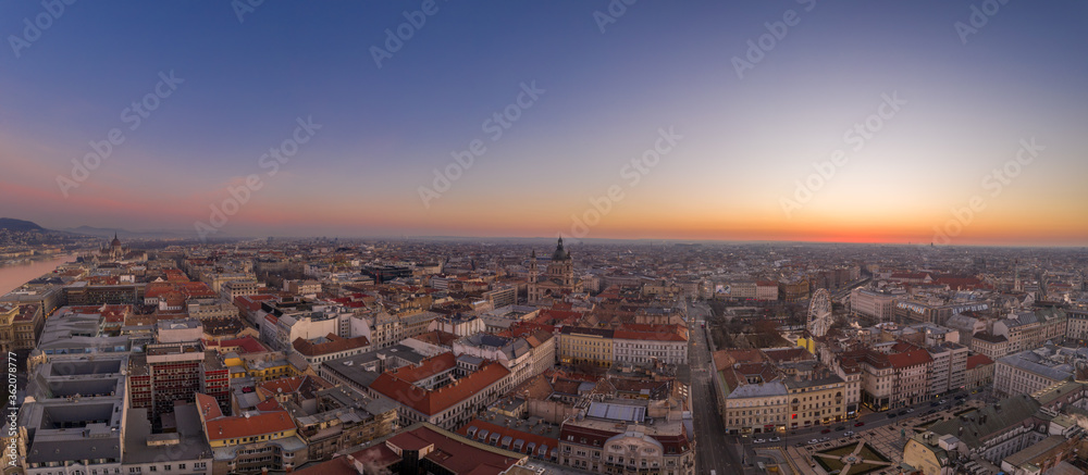 Panoramic aerial drone shot of St. Stephen Basilica at Budapest dawn sunrise in morning