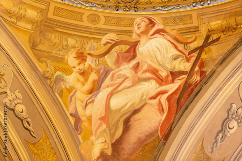 COMO, ITALY - MAY 8, 2015: The fresco of cardinal virtue of Faith in church Santuario del Santissimo Crocifisso by Carlo Inncenzo Carloni (first half of 18. cent.). photo