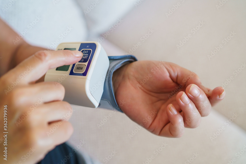 Patient measuring blood pressure. Hypertension Patient measuring blood pressure. Hypertension