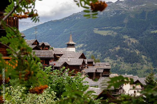 Scenic view on traditional wooden houses of the picturesque alpine village Grimentz in the municipality of Anniviers - canton Valais, Switzerland