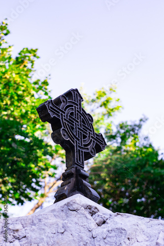 big iron cross against the sky. Symbol. photo