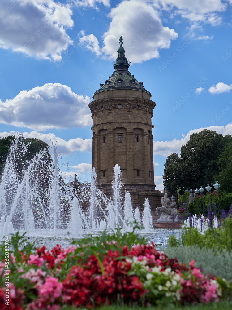 Fototapeta premium fountain in front of the tower