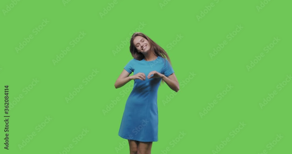 girl making sign heart shape by hand girl making sign heart shape by hand