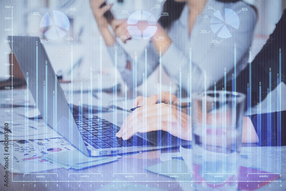 Multi exposure of woman hands typing on computer and forex chart hologram drawing. Stock market analysis concept. Multi exposure of woman hands typing on computer and forex chart hologram drawing. Stock market analysis concept.