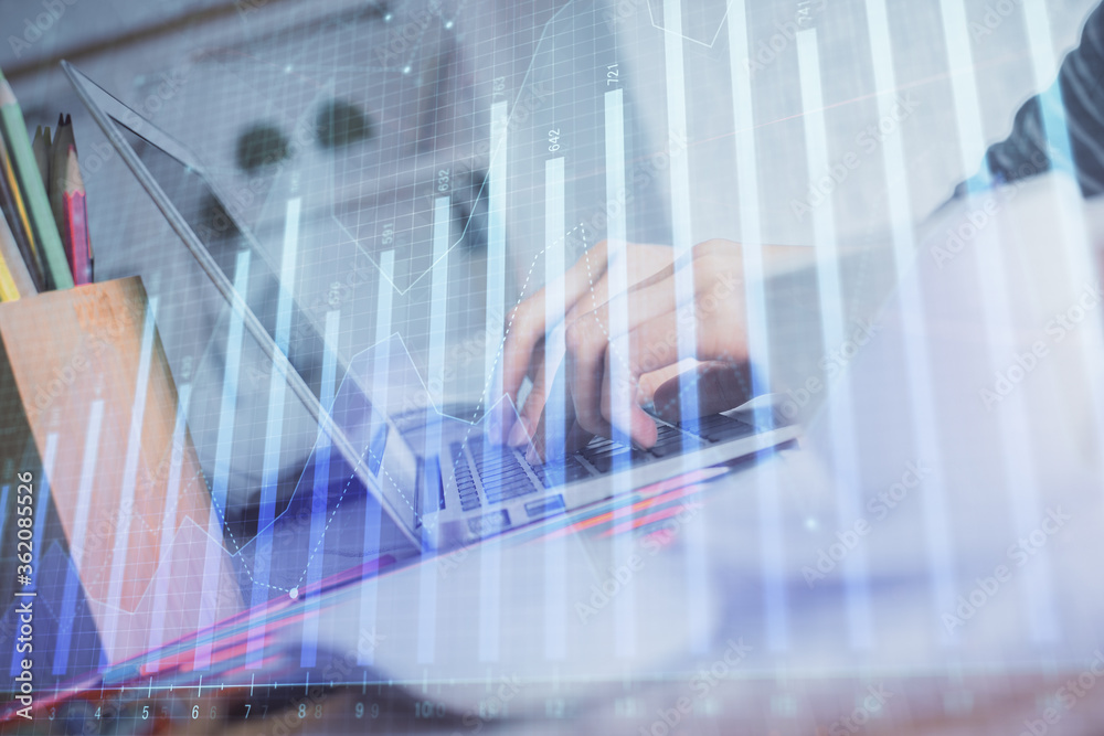 Double exposure of woman hands typing on computer and forex chart hologram drawing. Stock market invest concept. Double exposure of woman hands typing on computer and forex chart hologram drawing. Stock market invest concept.