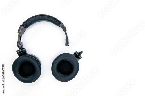 Broken headphones isolated on white background. Wireless headphone with speaker break. Broken headband repair shop DIY guide. Gadget repair shop banner template with text place. Earphones fix concept